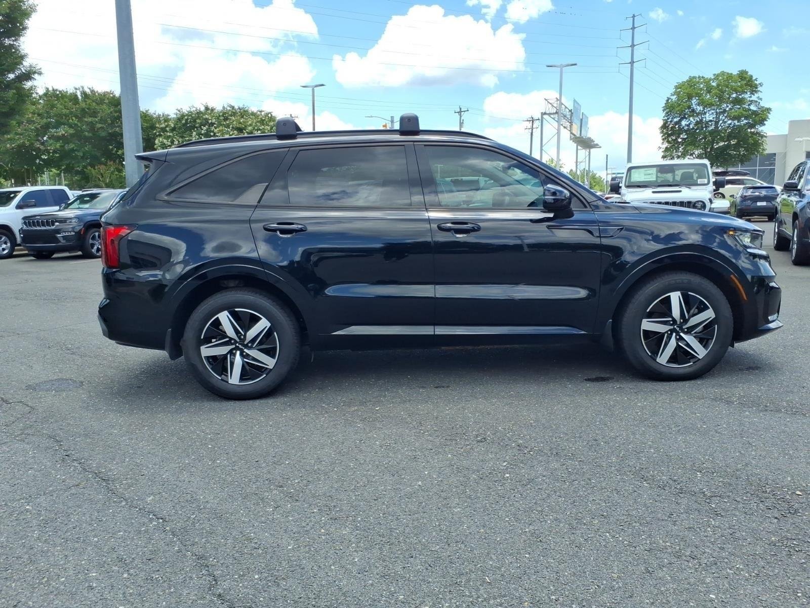 Used 2023 Ebony Black Kia EX image 4