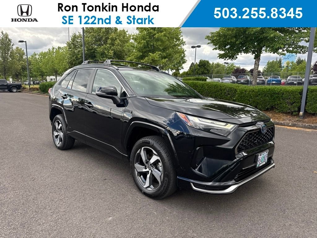 Used 2022 Midnight Black Metallic Toyota SE image 1