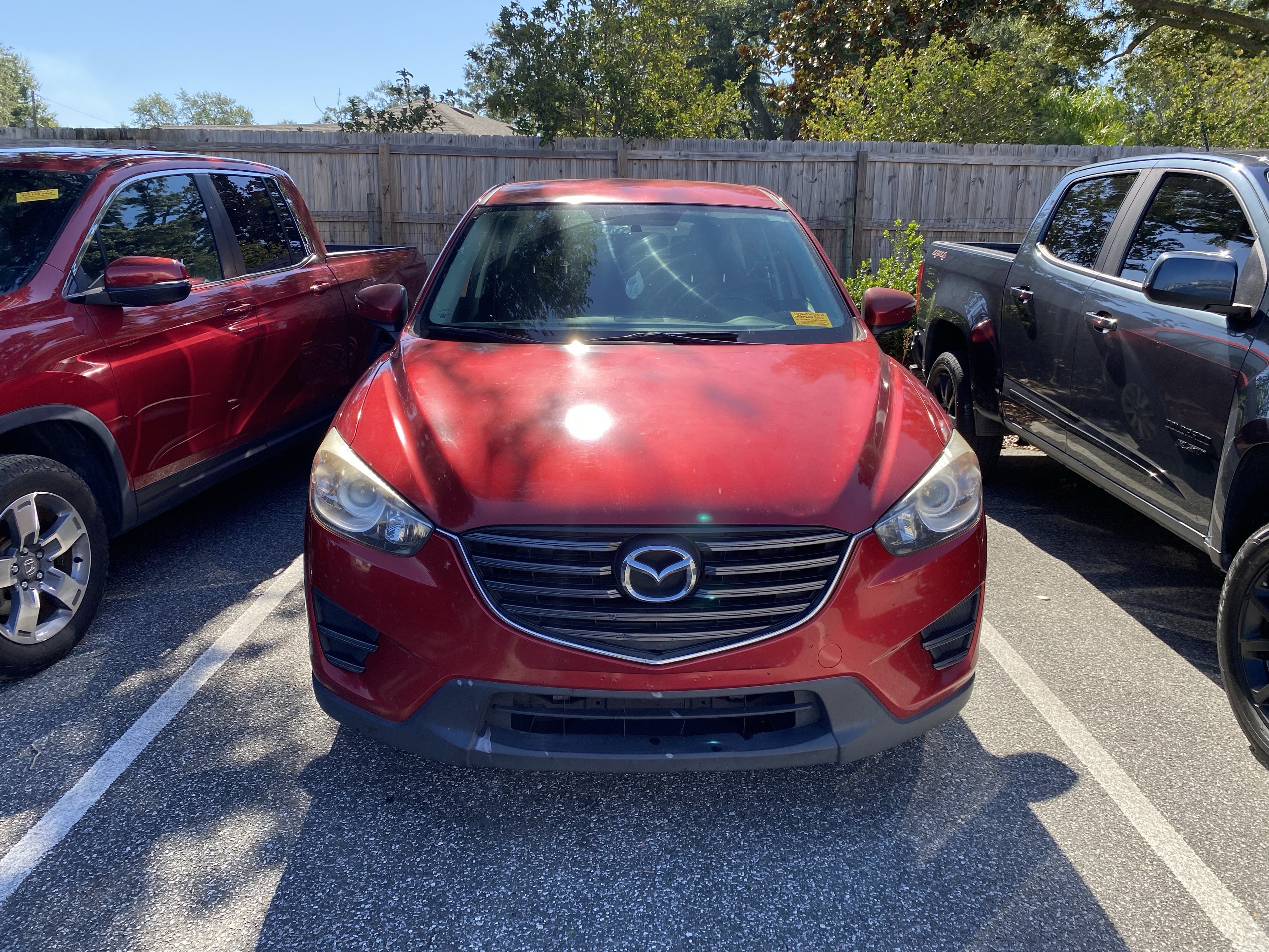 Used 2016 Mazda CX-5 Sport with VIN JM3KE2BY9G0890265 for sale in Winter Haven, FL