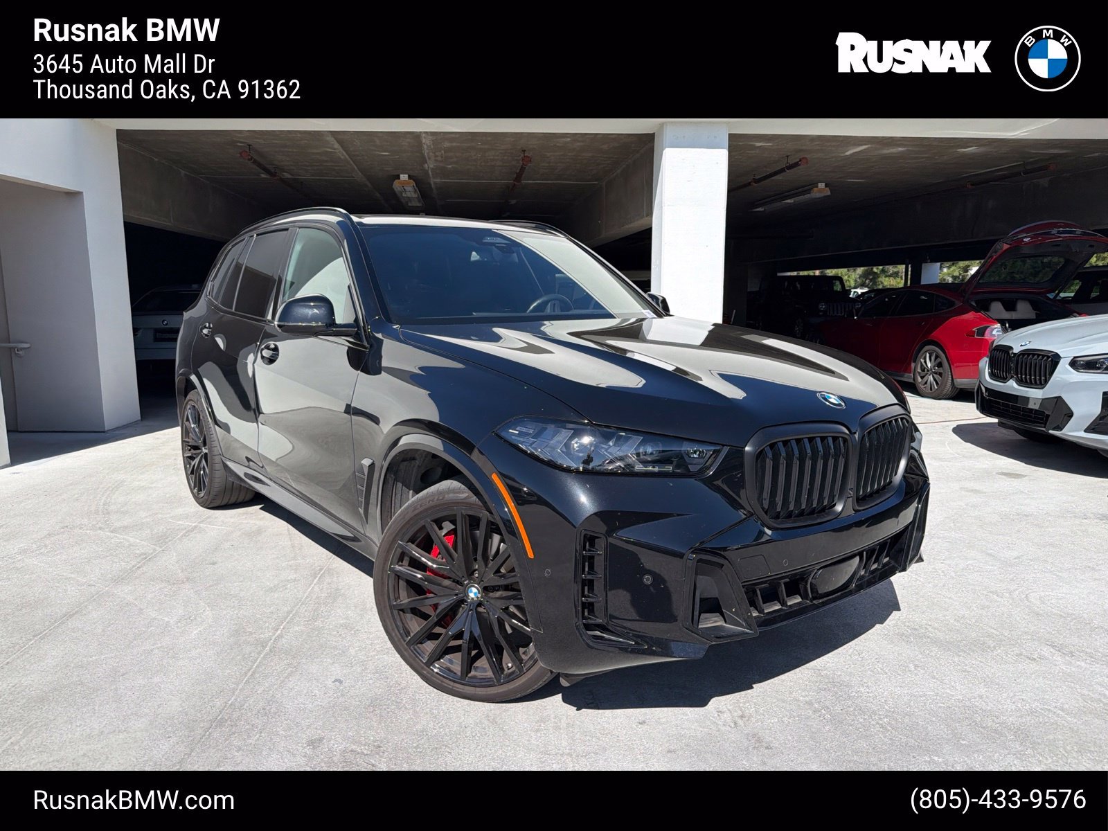 Used 2024 Black Sapphire Metallic BMW sDrive40i image 1
