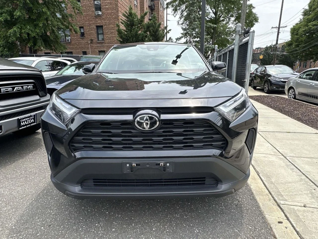 Used 2025 Midnight Black Metallic Toyota LE image 6