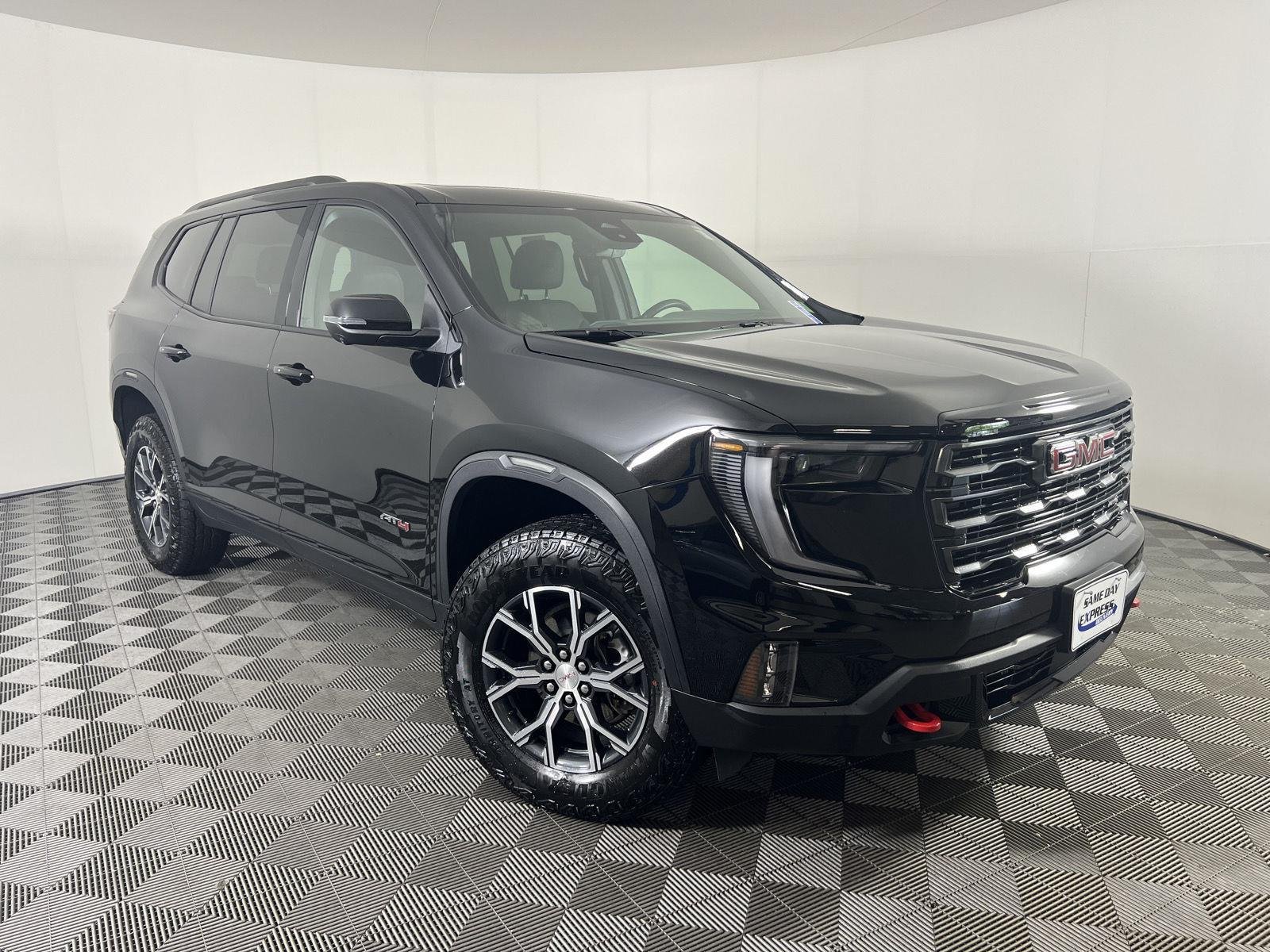 Used 2026 Ebony Twilight Metallic GMC AWD AT4 image 1