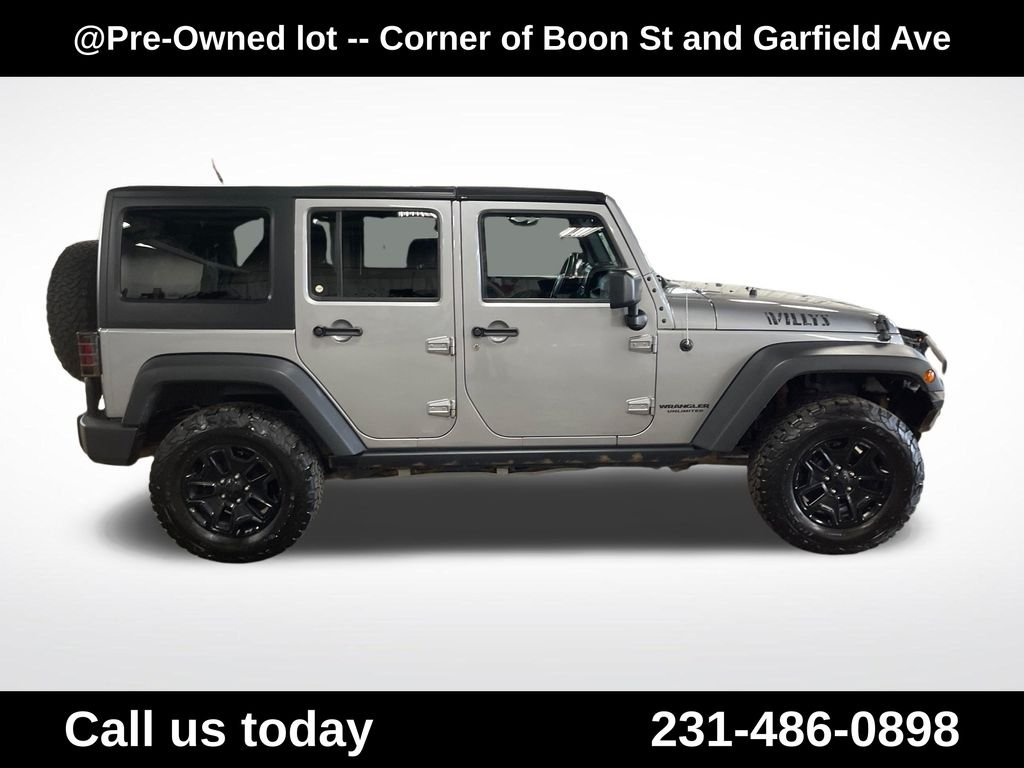 Used 2015 Silver Jeep Unlimited Sport image 6