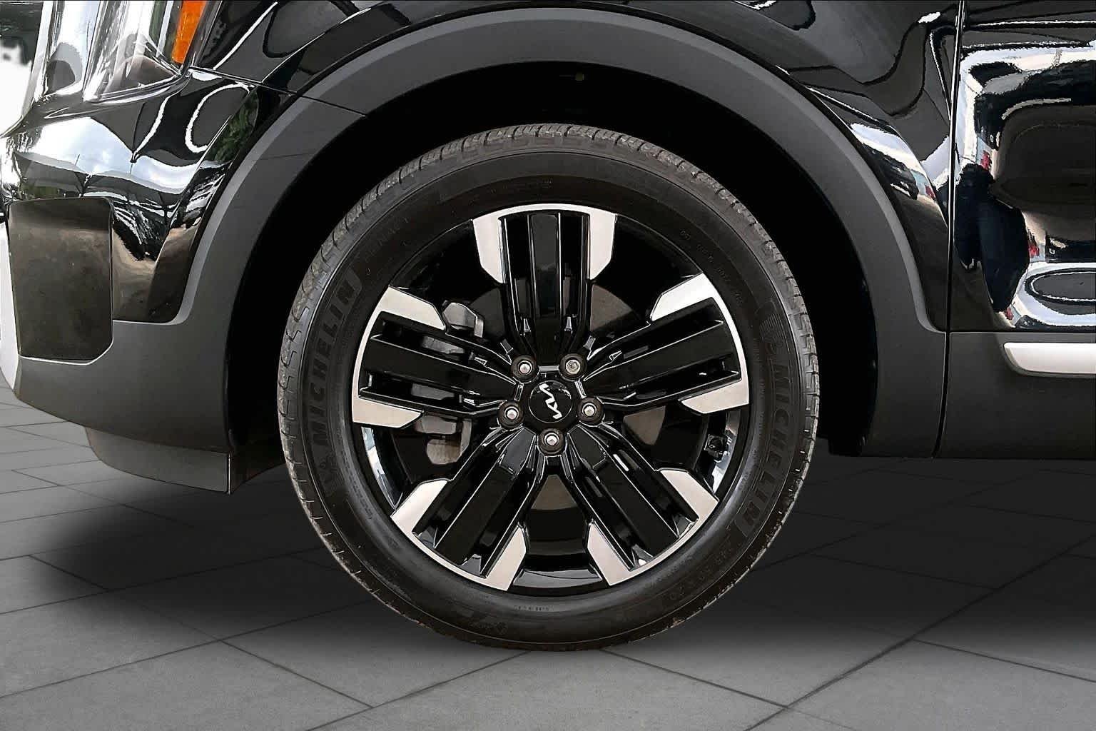 Used 2024 Ebony Black Kia SX Prestige image 11