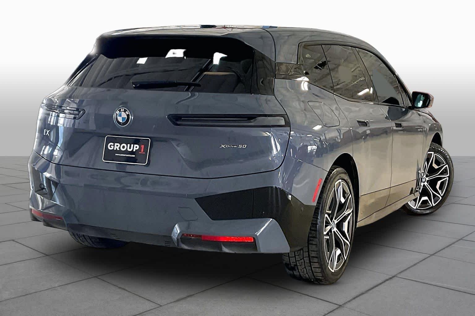 Used 2024 Storm Bay Metallic BMW xDrive50 image 12