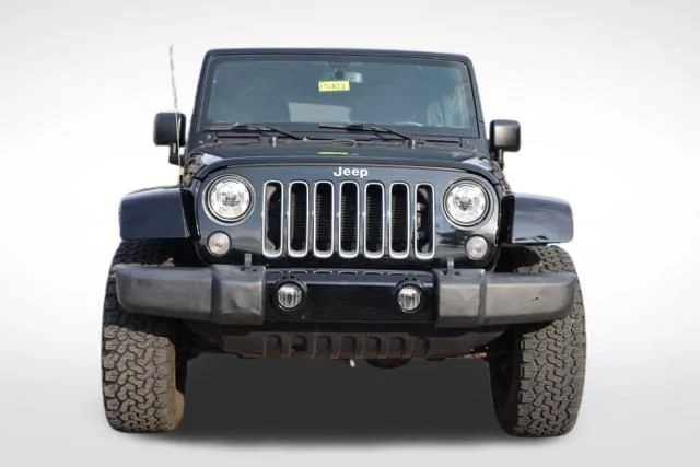 Used 2017 Black Jeep Unlimited Sahara image 4