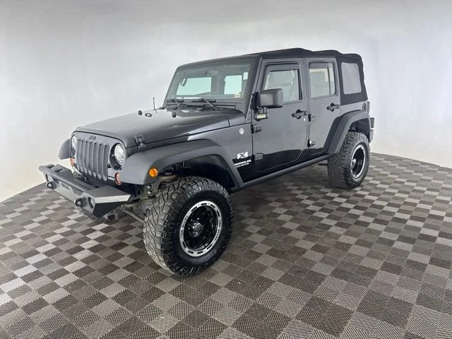 Used 2009 Black Jeep Unlimited X image 4