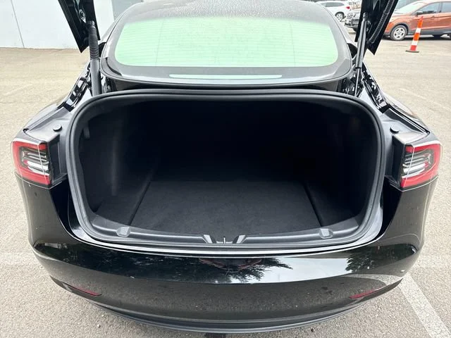 Used 2023 Solid Black Tesla Base image 24