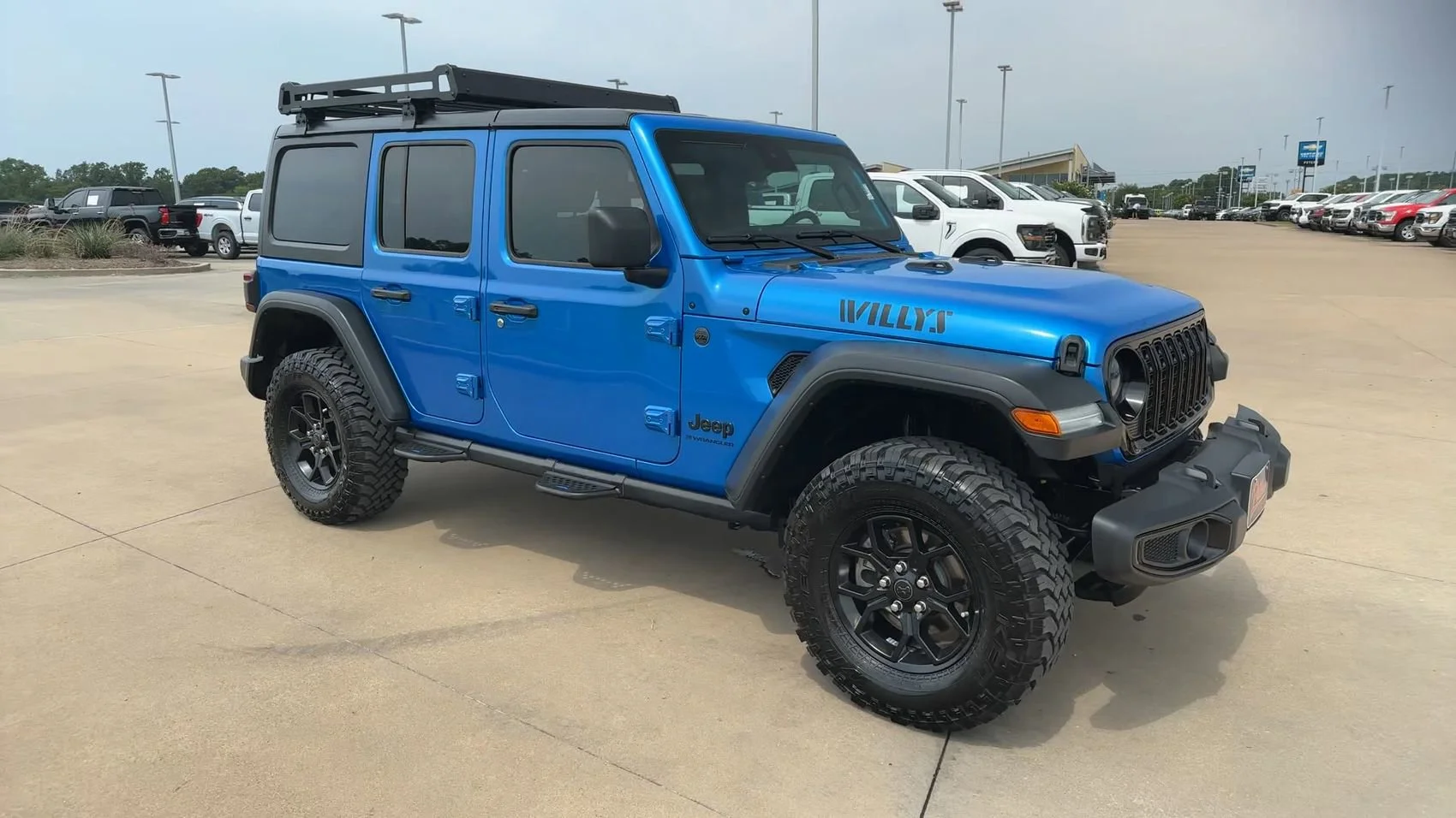 Used 2024 Hydro Blue Pearl Coat Jeep Sport image 3