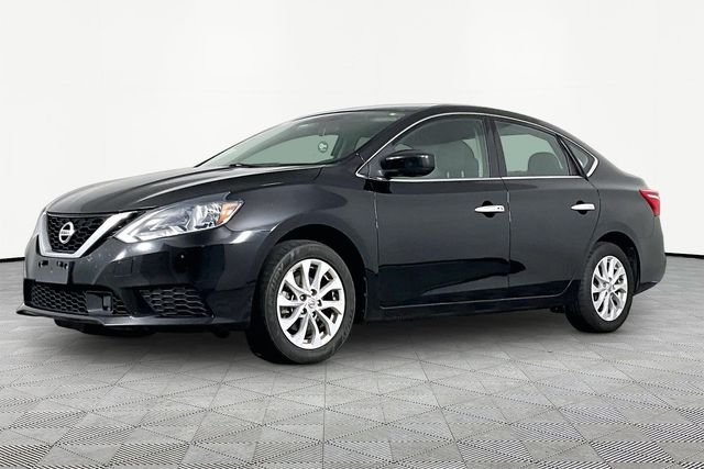 Used 2019 Black Nissan SV image 1