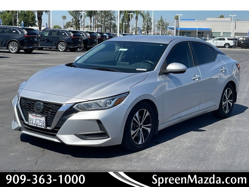 Used 2021 Brilliant Silver Metallic Nissan SV image 1