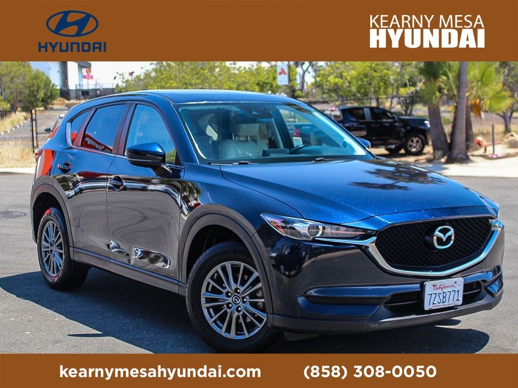 Used 2017 Crystal Blue Mazda Touring image 1