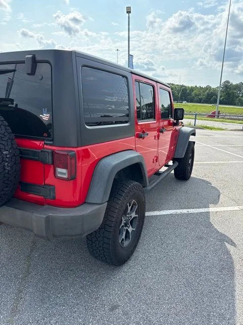Used 2016 Firecracker Red Clearcoat Jeep Unlimited Sport image 5