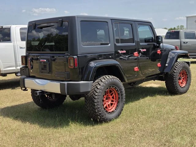 Used 2014 Black Jeep Unlimited Sahara image 9