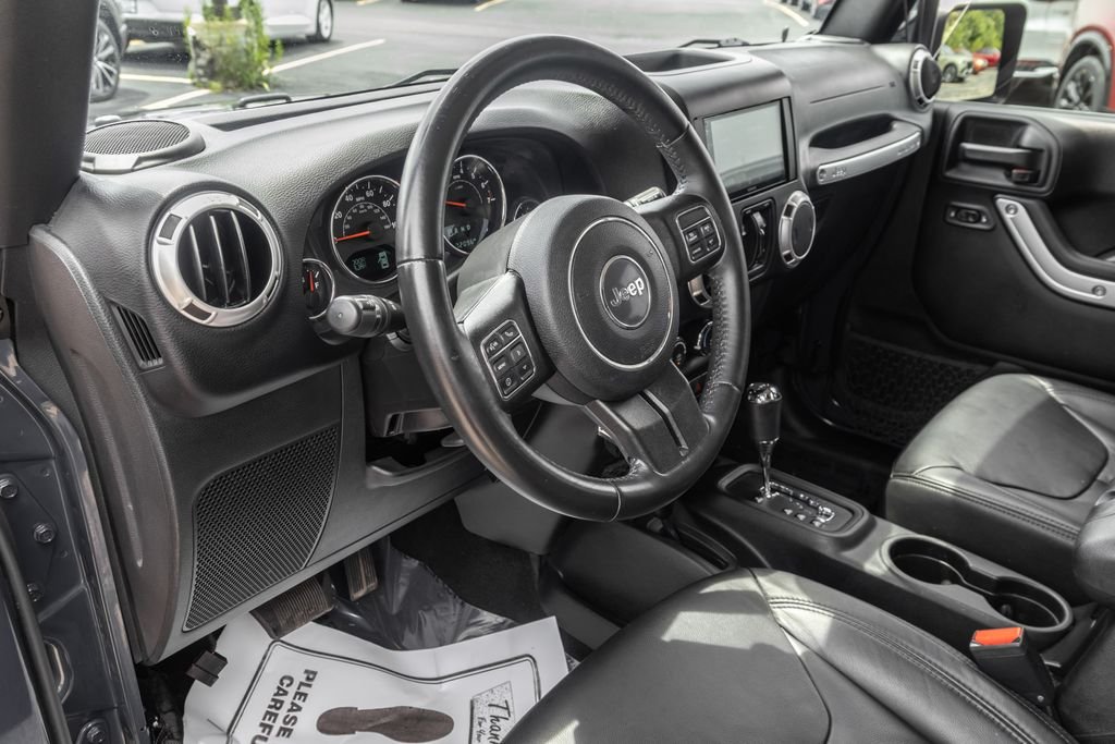 Used 2017 Black Jeep Unlimited Sahara image 15