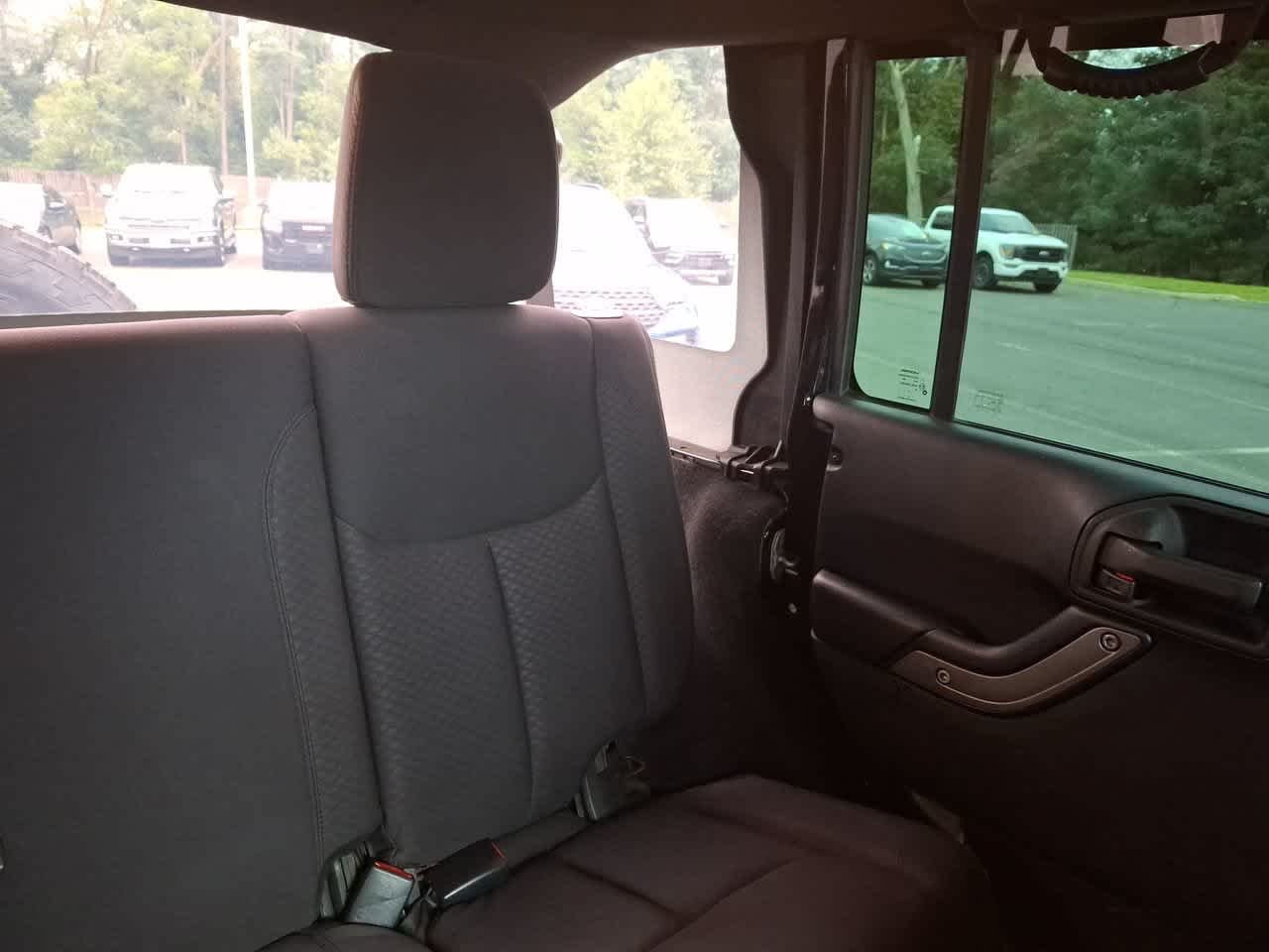 Used 2013 Black Clearcoat Jeep Sport image 14