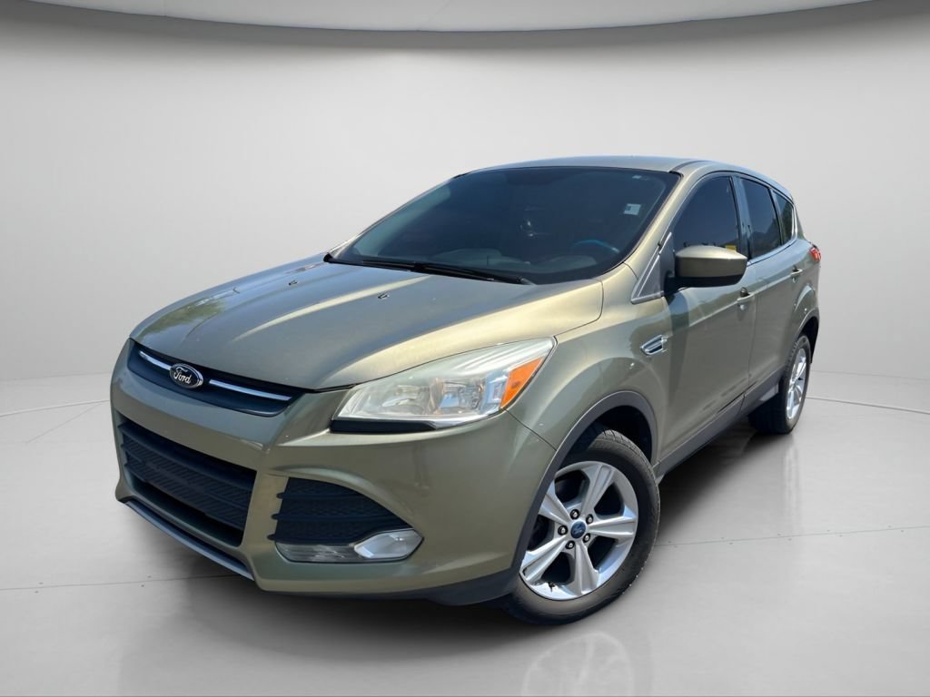 Used 2013 Ginger Ale Metallic Ford SE image 14