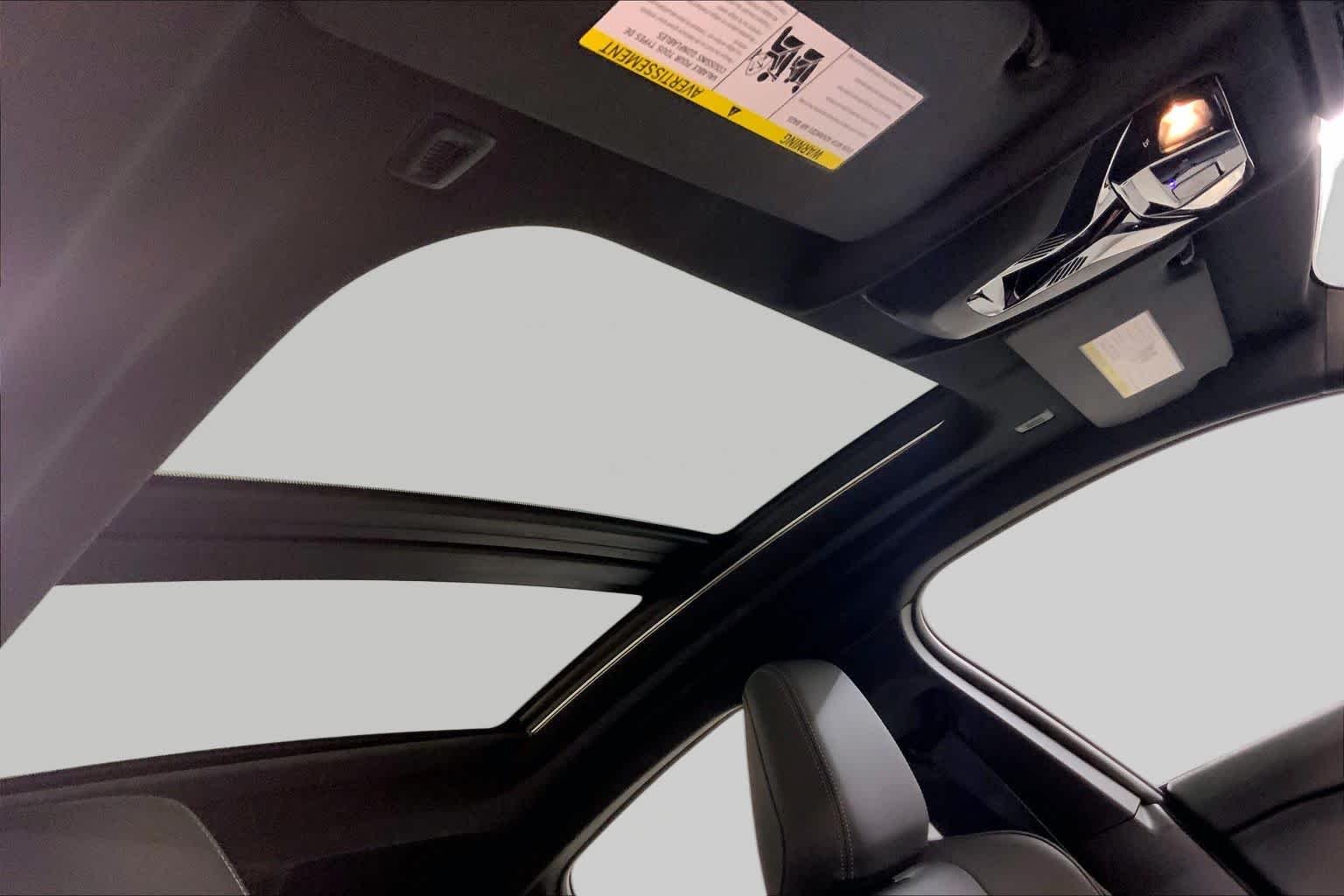 Used 2025 Black Sapphire Metallic BMW 228 xDrive image 13