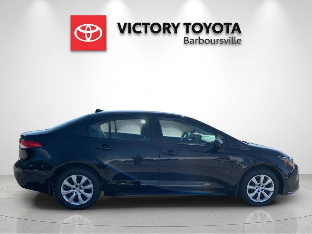 Used 2026 Black Toyota LE image 6