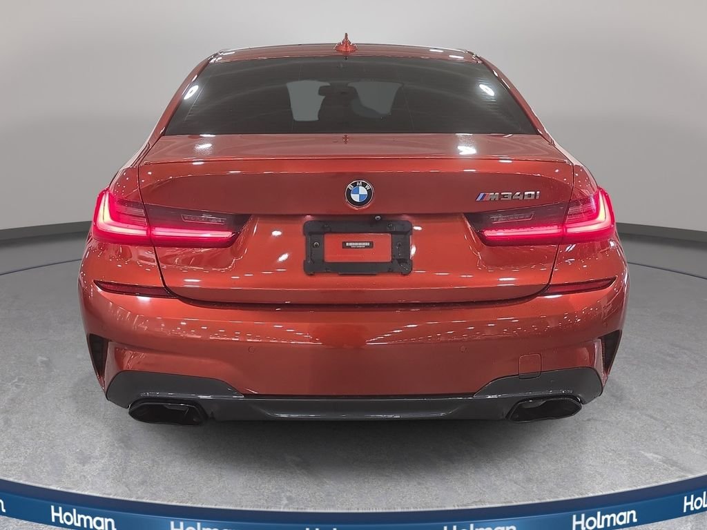 Used 2021 Sunset Orange Metallic BMW M340i image 7