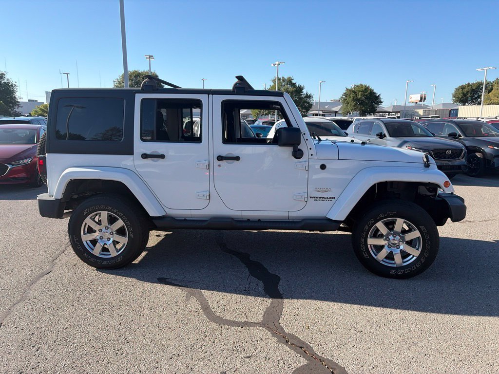 Used 2013 White Jeep Unlimited Sahara image 9