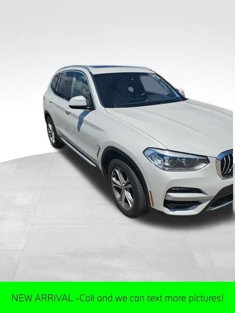 Used 2021 White BMW xDrive30i image 1