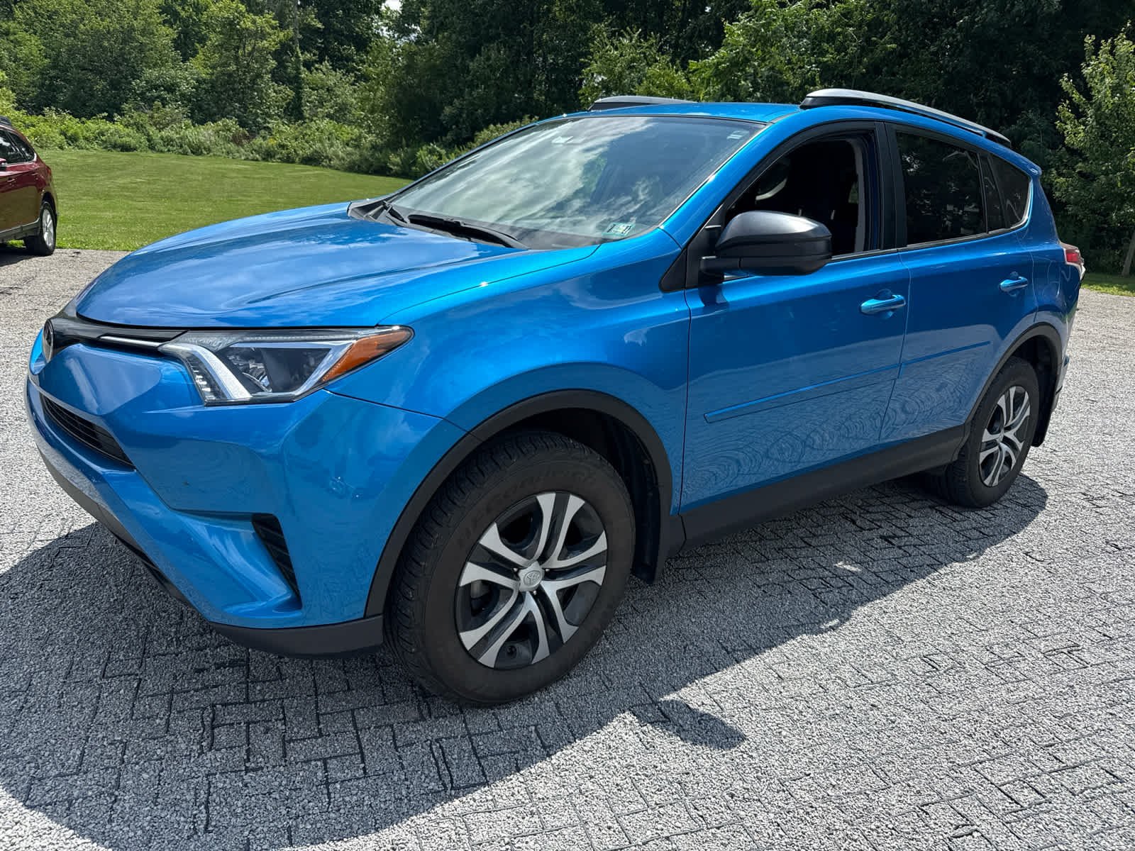 Used 2018 Electric Storm Blue Toyota LE image 3