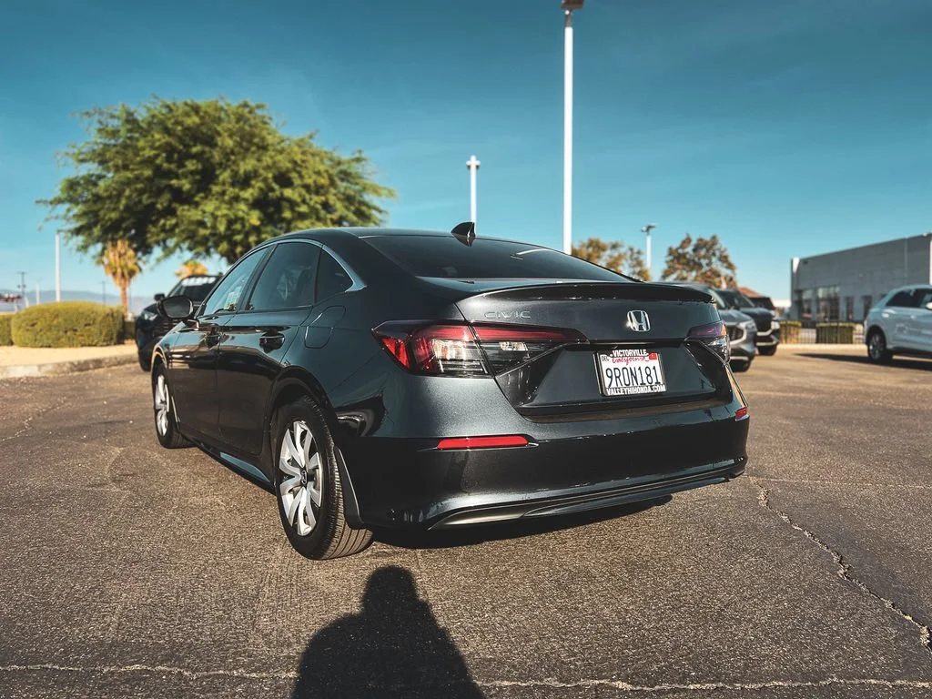Certified Used 2025 Meteorite Gray Metallic Honda 4D LX image 31