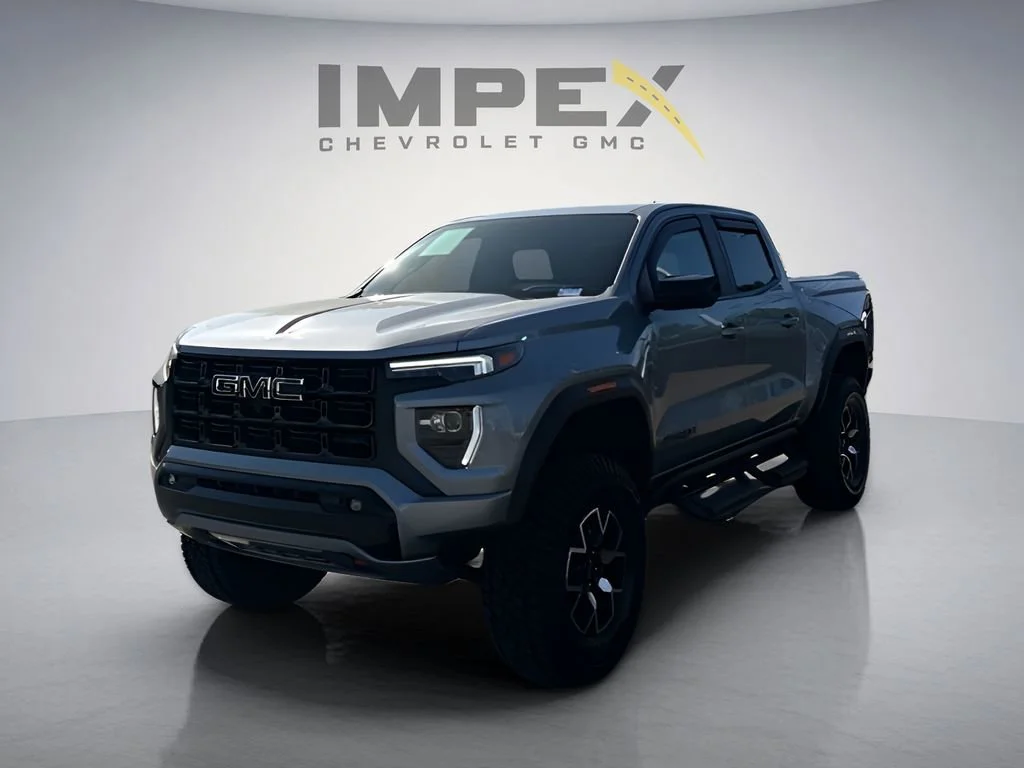 Used 2023 Sterling Metallic GMC AT4X image 1