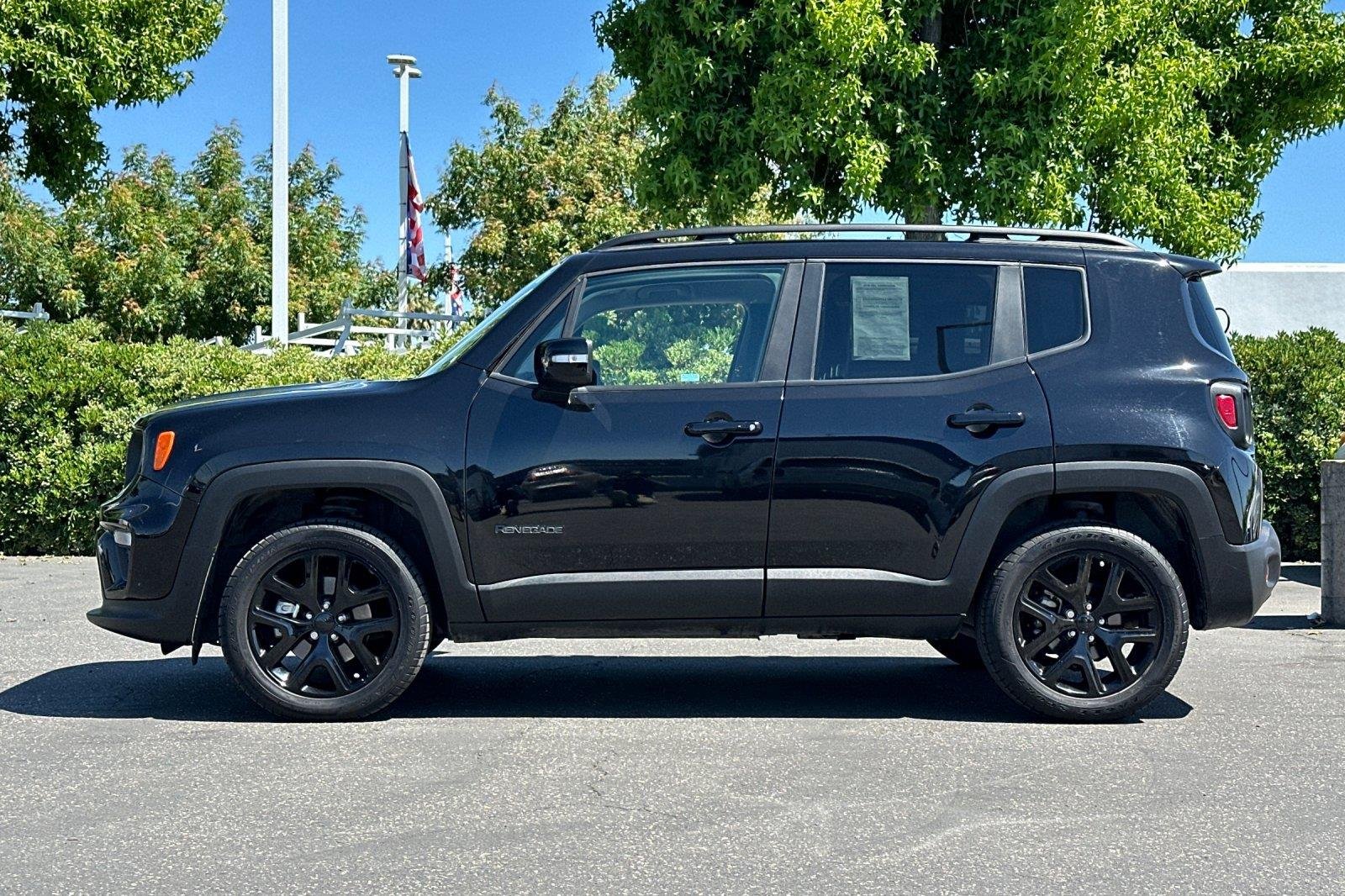 Used 2023 Black Clearcoat Jeep Altitude image 7