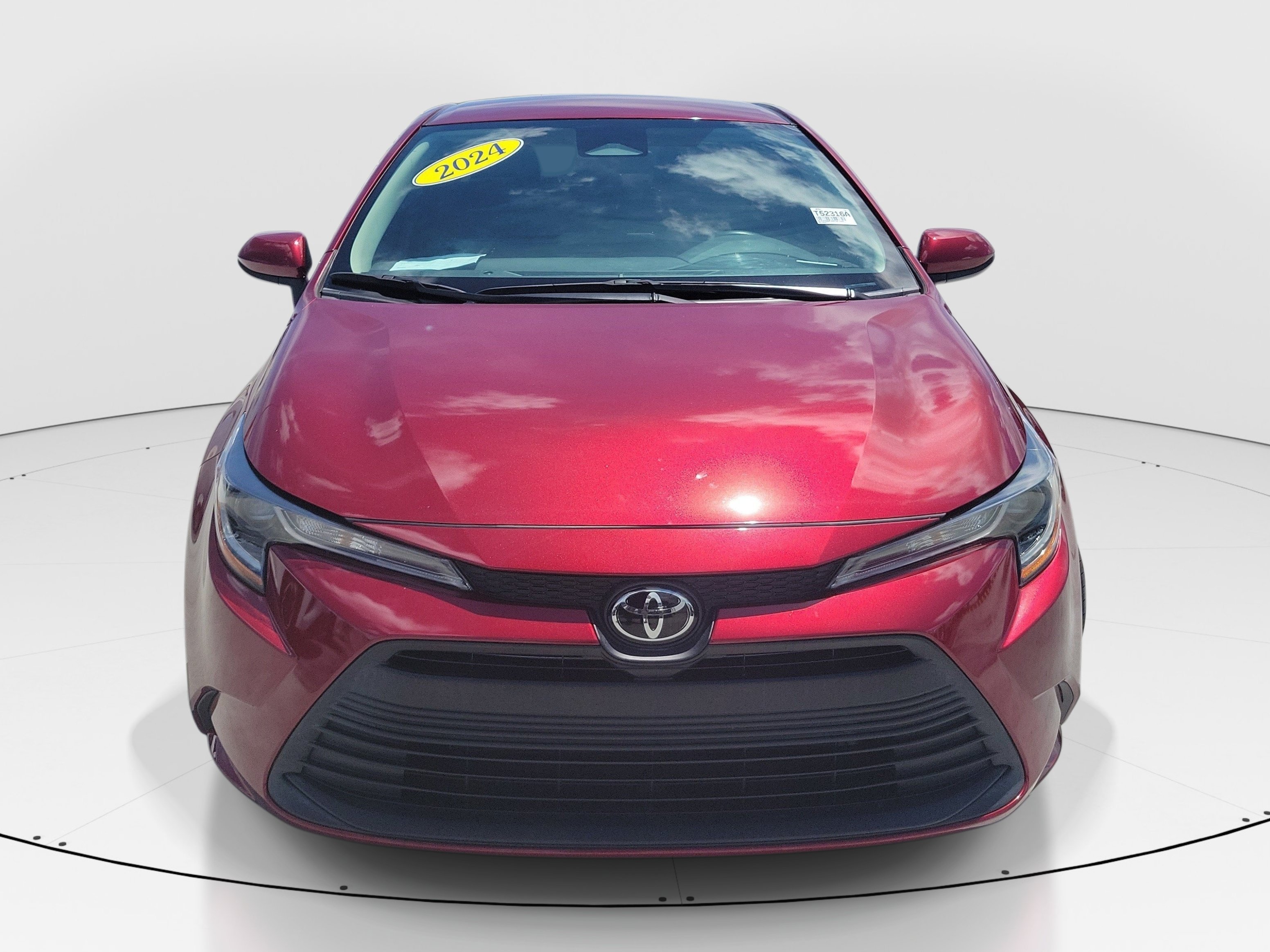 Used 2024 Pearl Toyota LE image 2