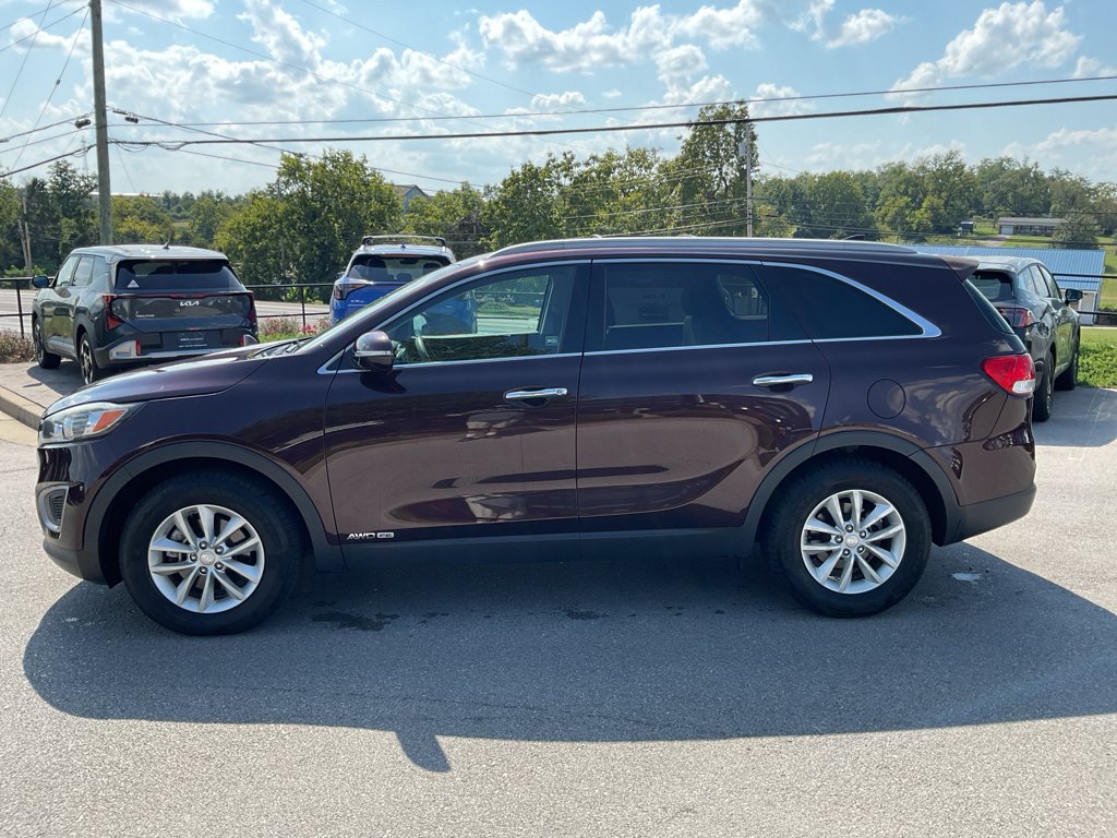 Used 2016 Dark Cherry Kia LX image 6