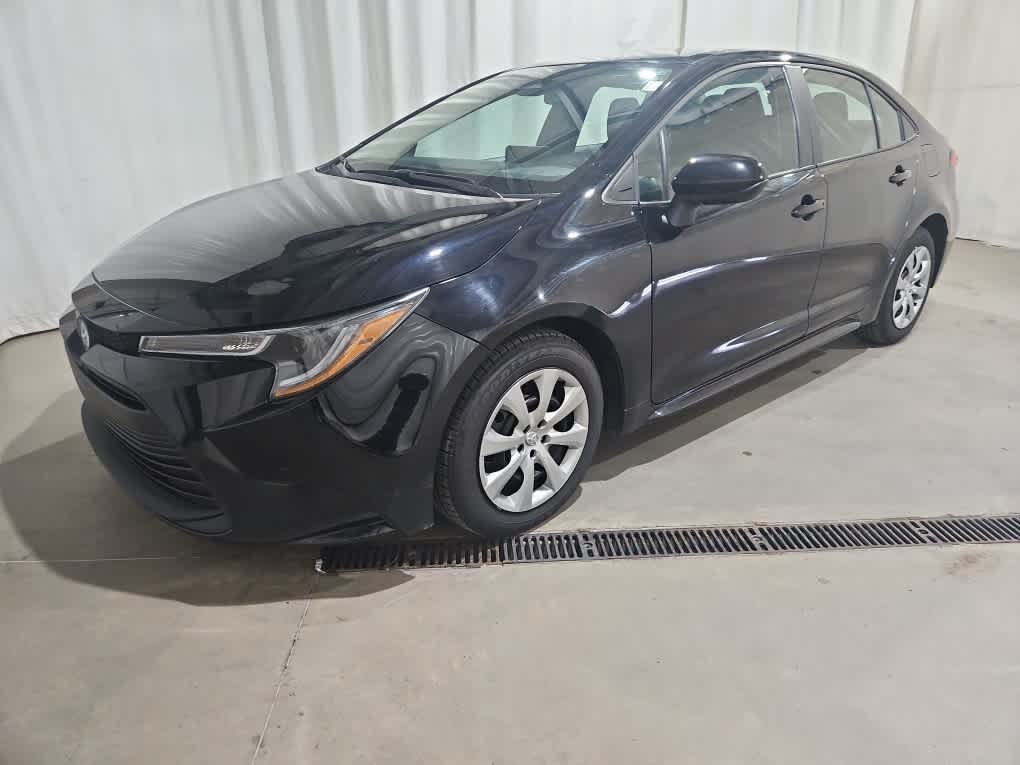 Used 2024 Midnight Black Metallic Toyota LE image 3