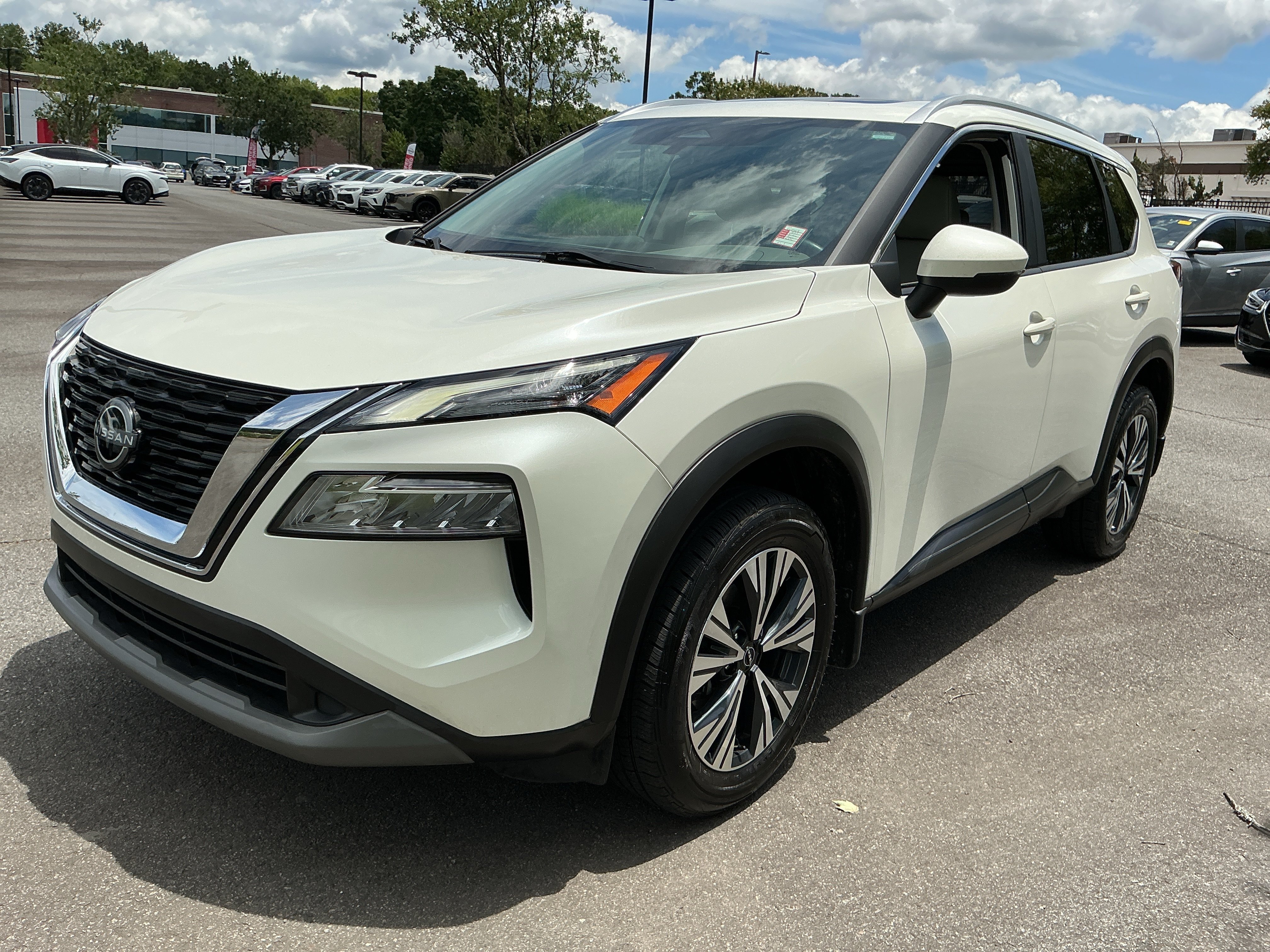 Used 2023 Pearl White Tricoat Nissan SV image 1