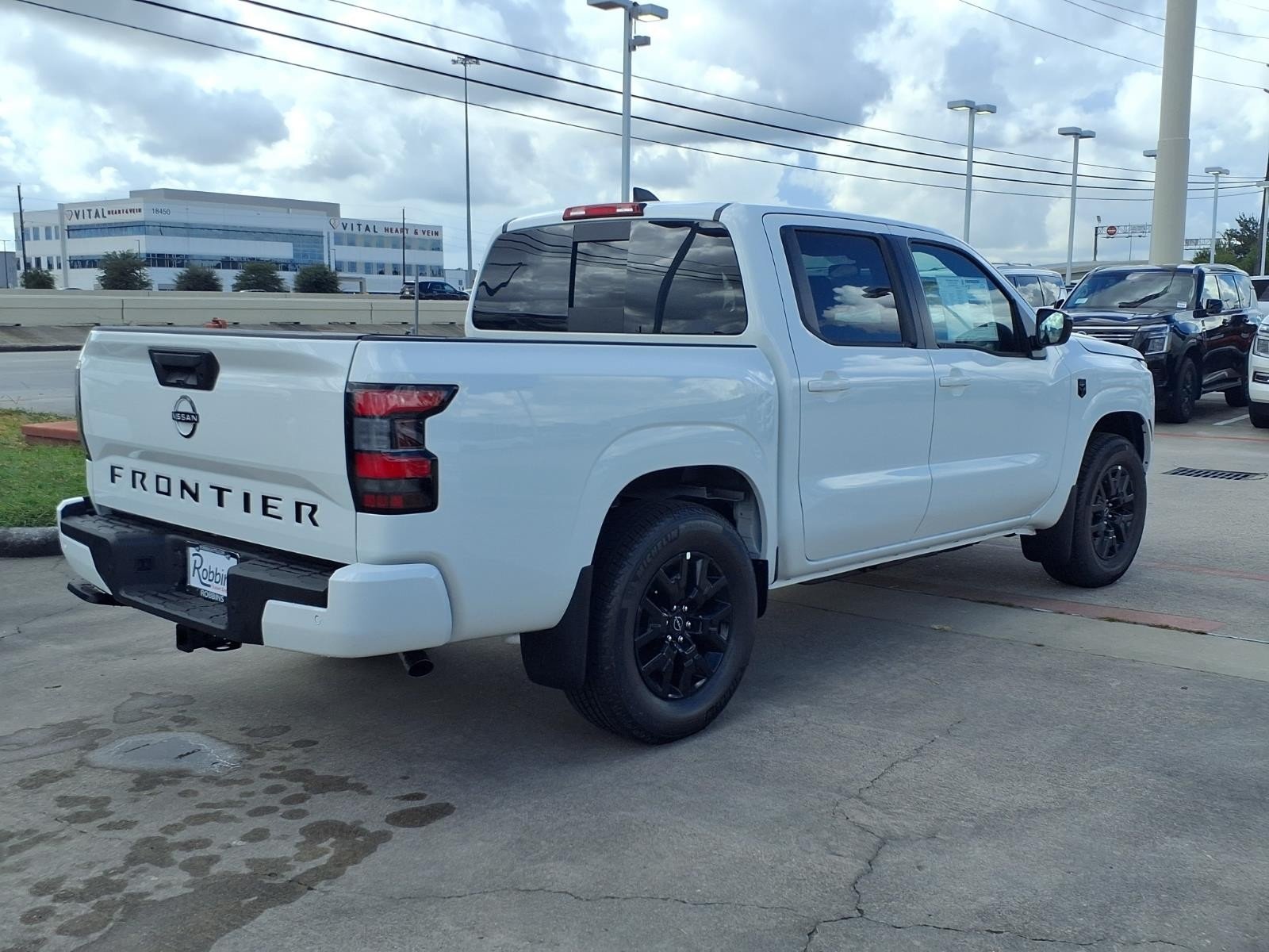 2026 Nissan Frontier Crew Cab SV White at Robbins Nissan