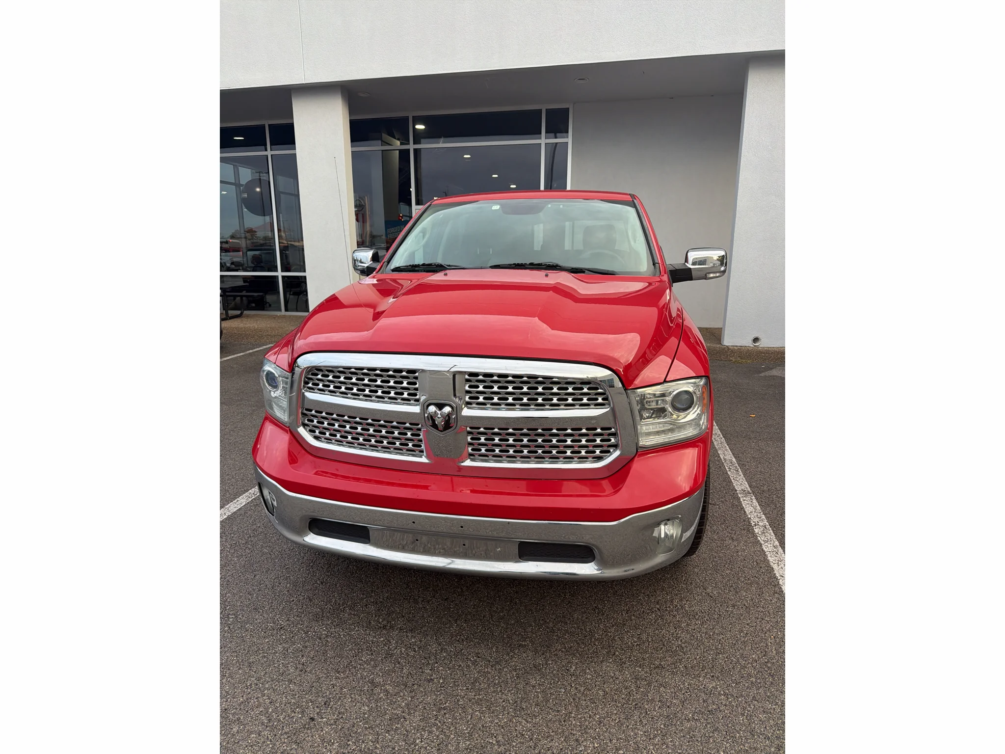 Used 2015 Flame Red Clearcoat Ram Laramie image 1