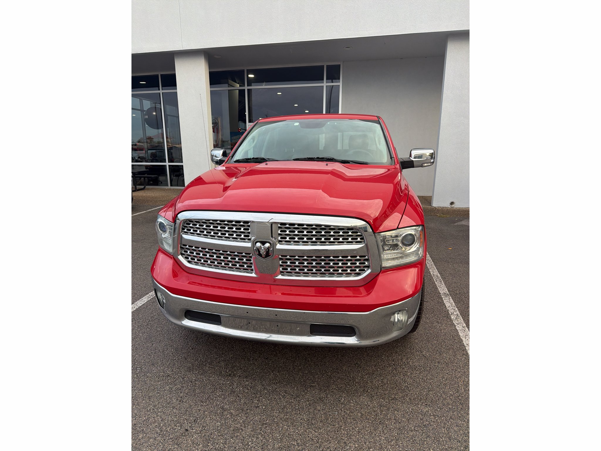 Used 2015 Flame Red Clearcoat Ram Laramie image 1
