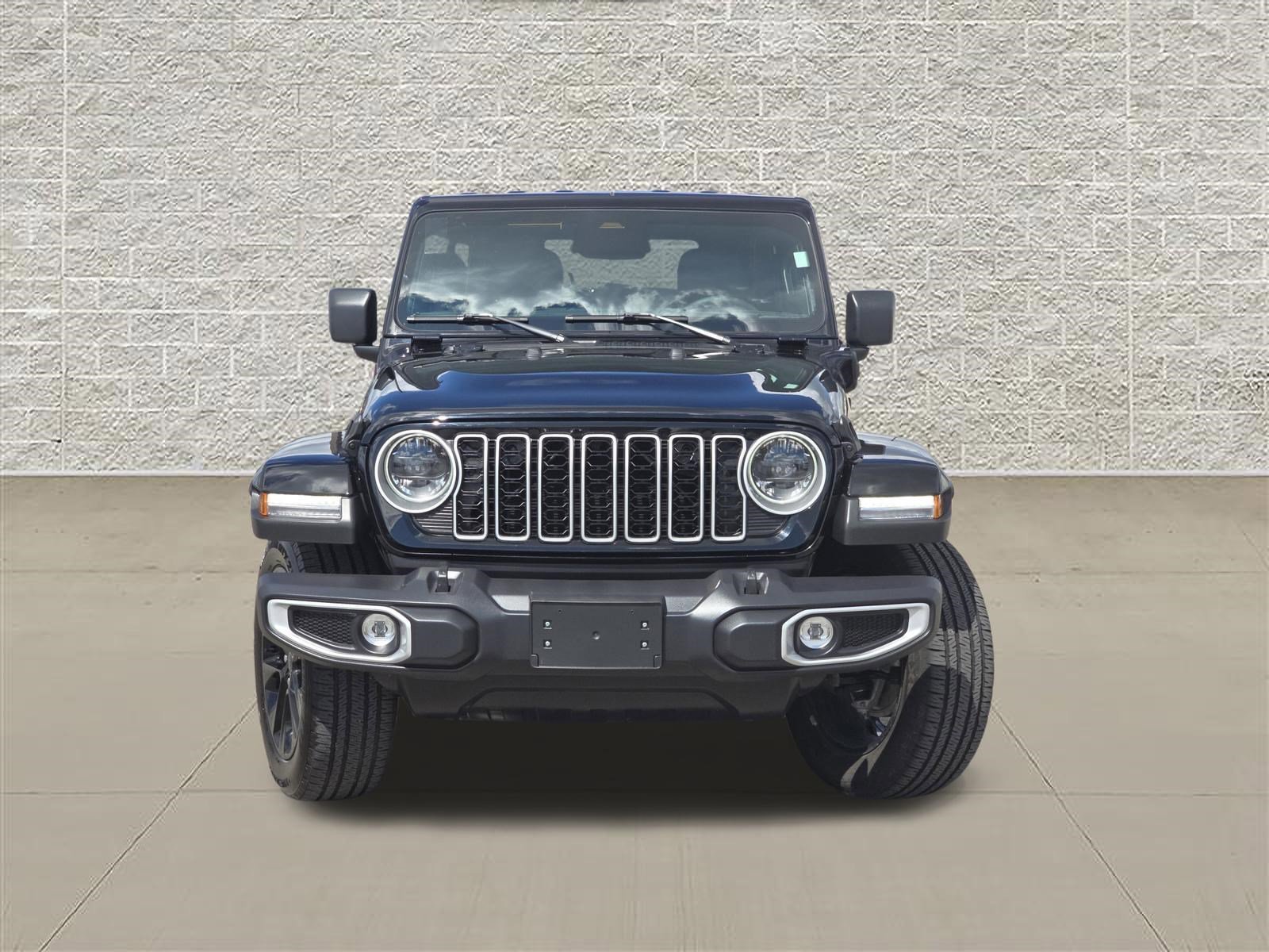 Used 2025 Jeep Wrangler 4xe Sahara 4XE with VIN 1C4RJXP67SW583710 for sale in Whitehall, OH