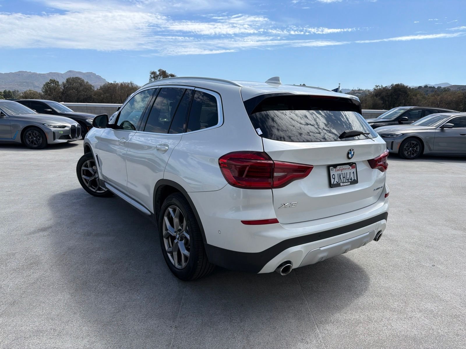Used 2021 Mineral White Metallic BMW sDrive30i image 2