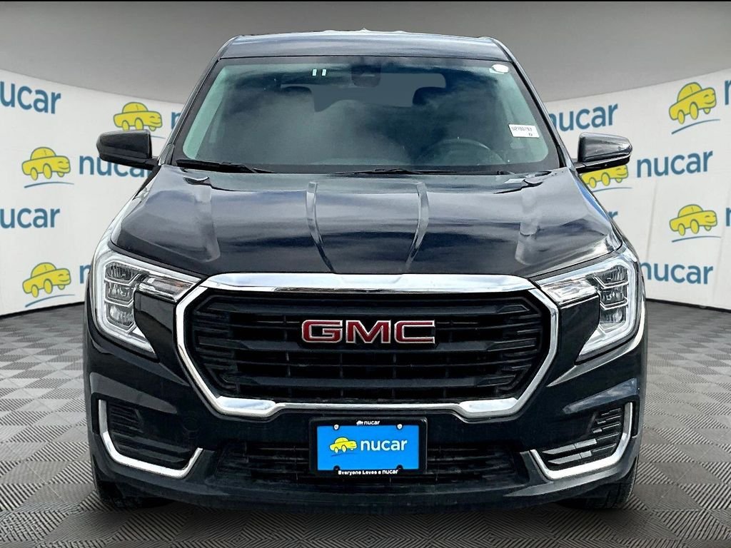 Used 2024 Ebony Twilight Metallic GMC SLE image 2