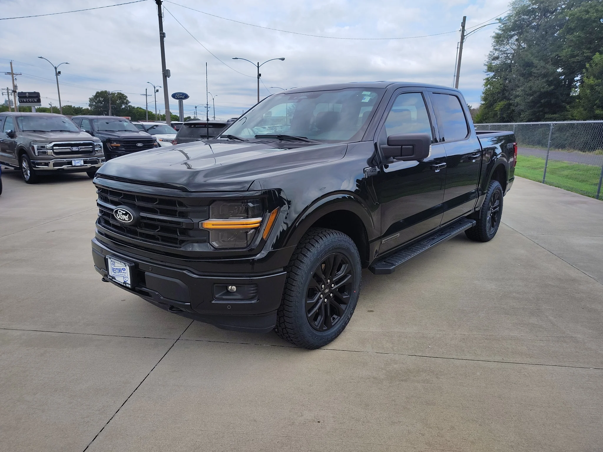 Used 2024 Agate Black Metallic Ford XLT image 7