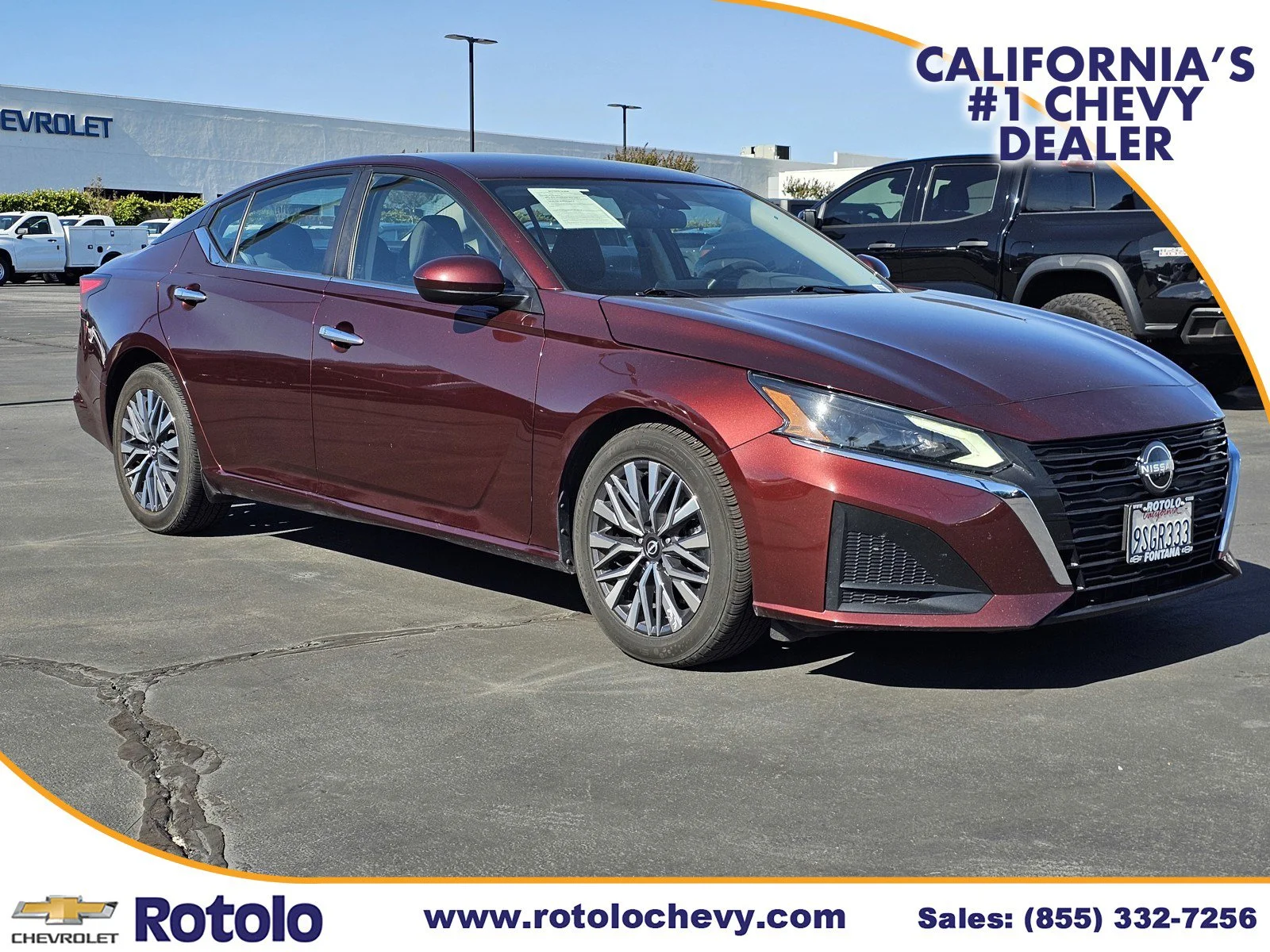 Used 2023 Garnet Pearl Metallic Nissan 2.5 SV image 1