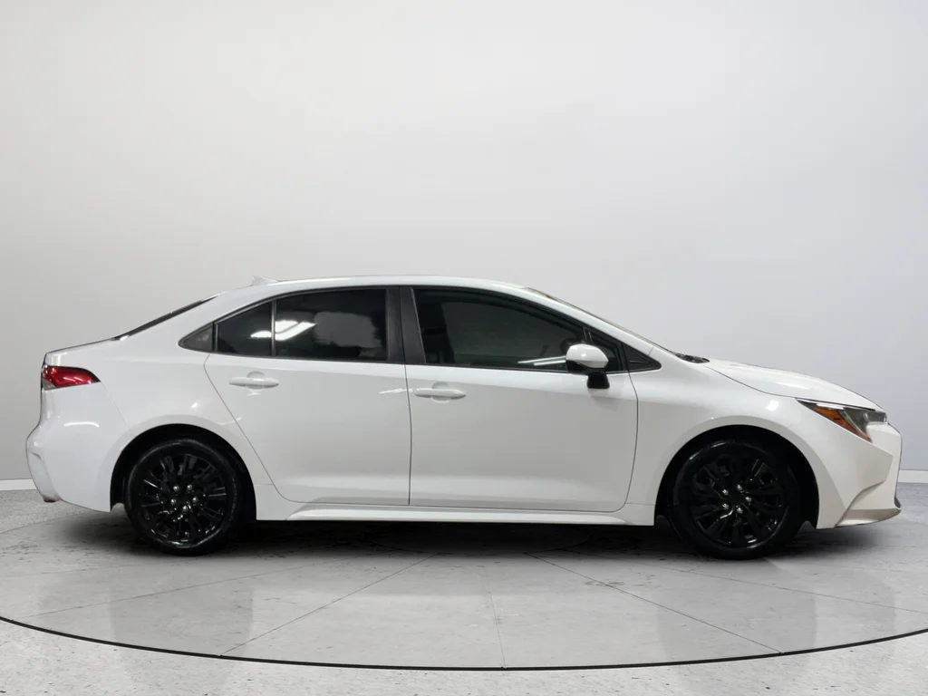 Used 2021 White Toyota LE image 6