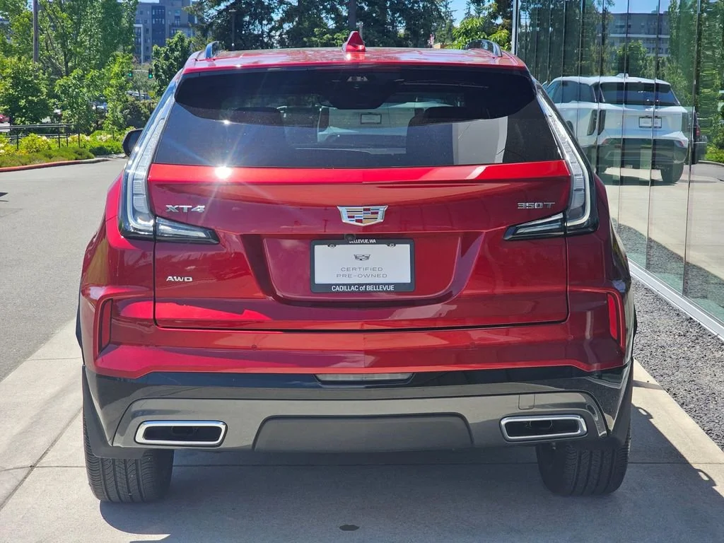 Used 2024 Radiant Red Tintcoat Cadillac Sport image 4