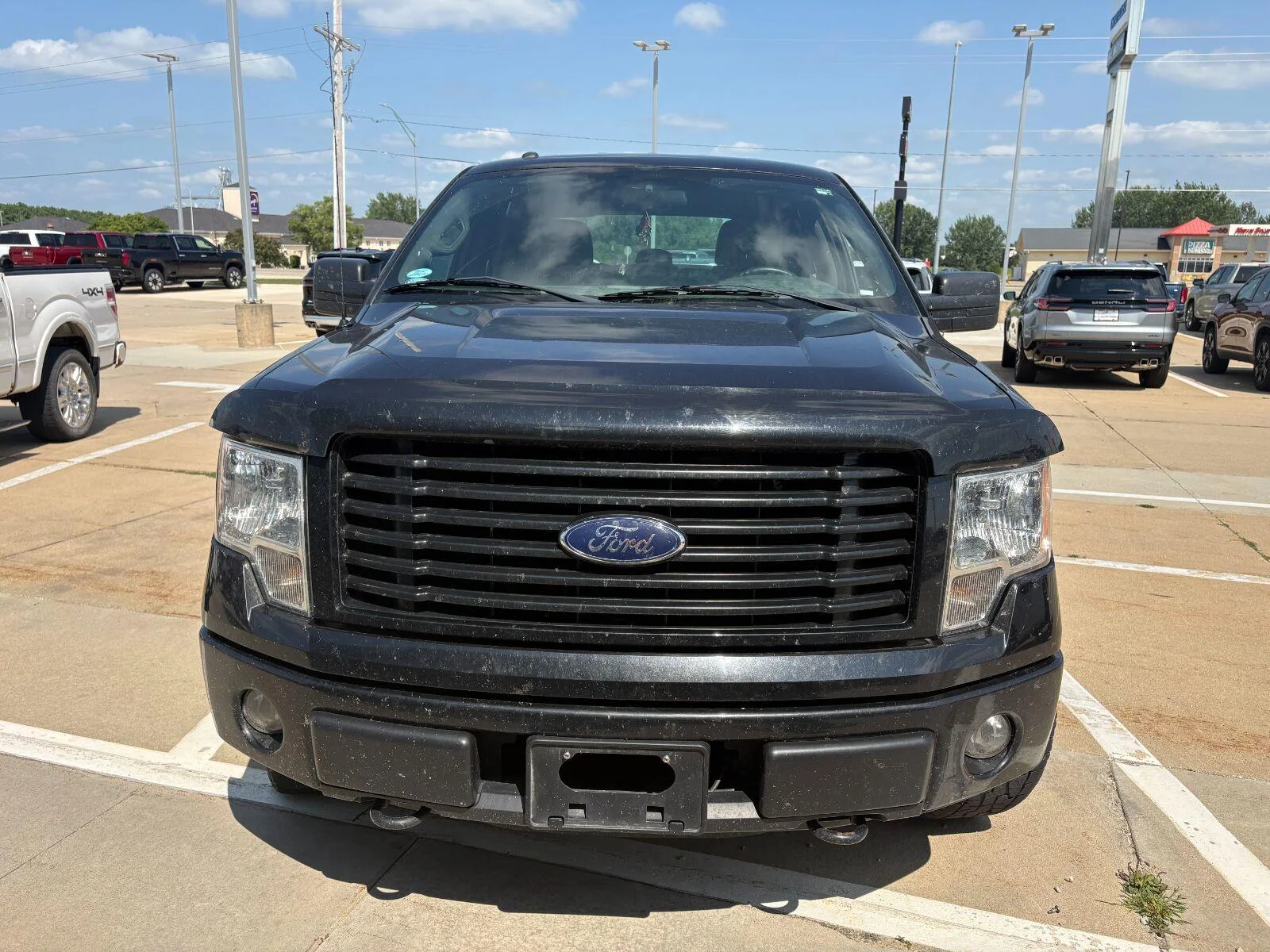 Used 2014 Ford F-150 STX with VIN 1FTFW1EFXEKD32048 for sale in Charles City, IA