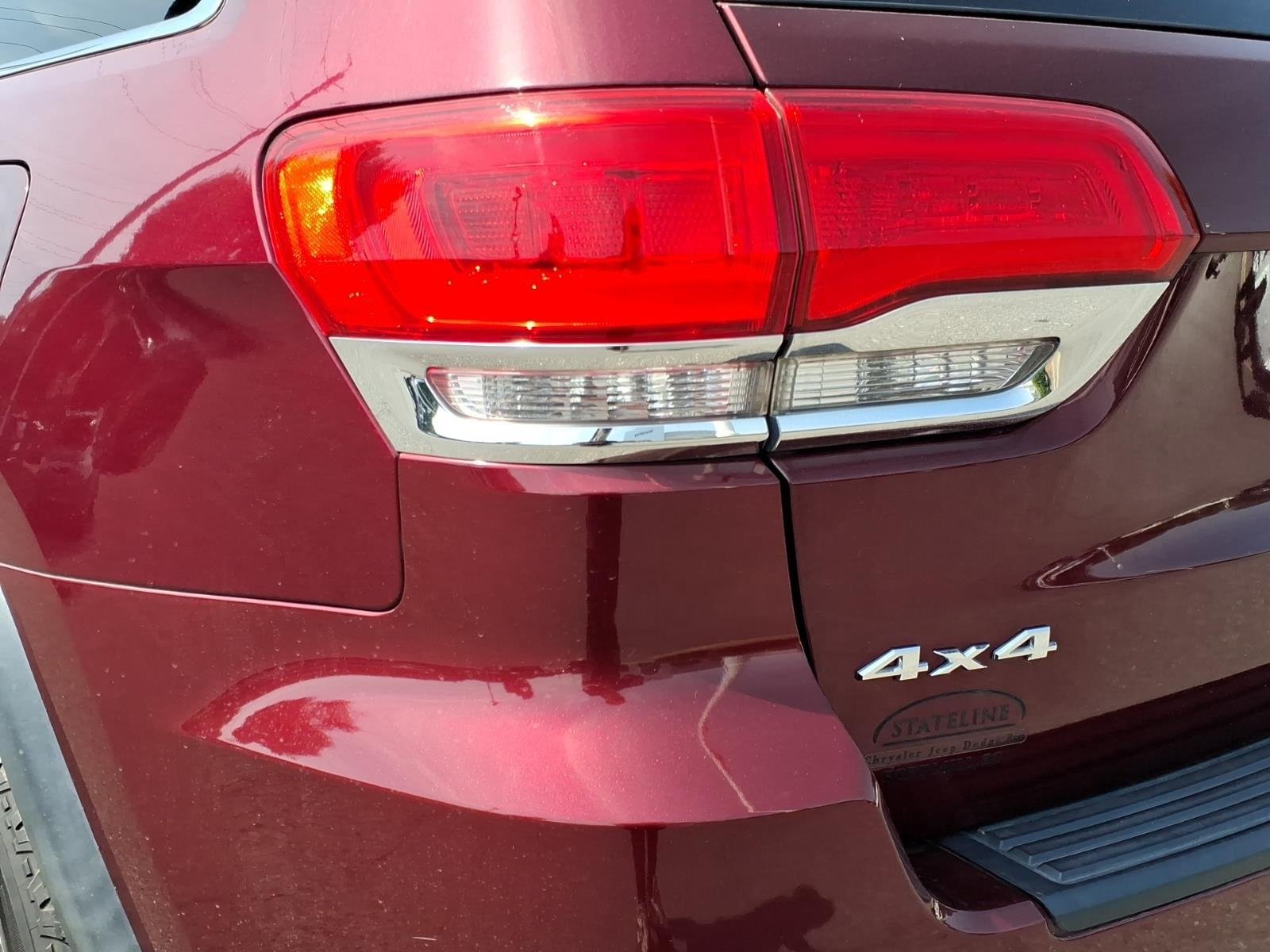Used 2018 Velvet Red Pearlcoat Jeep Laredo E image 16