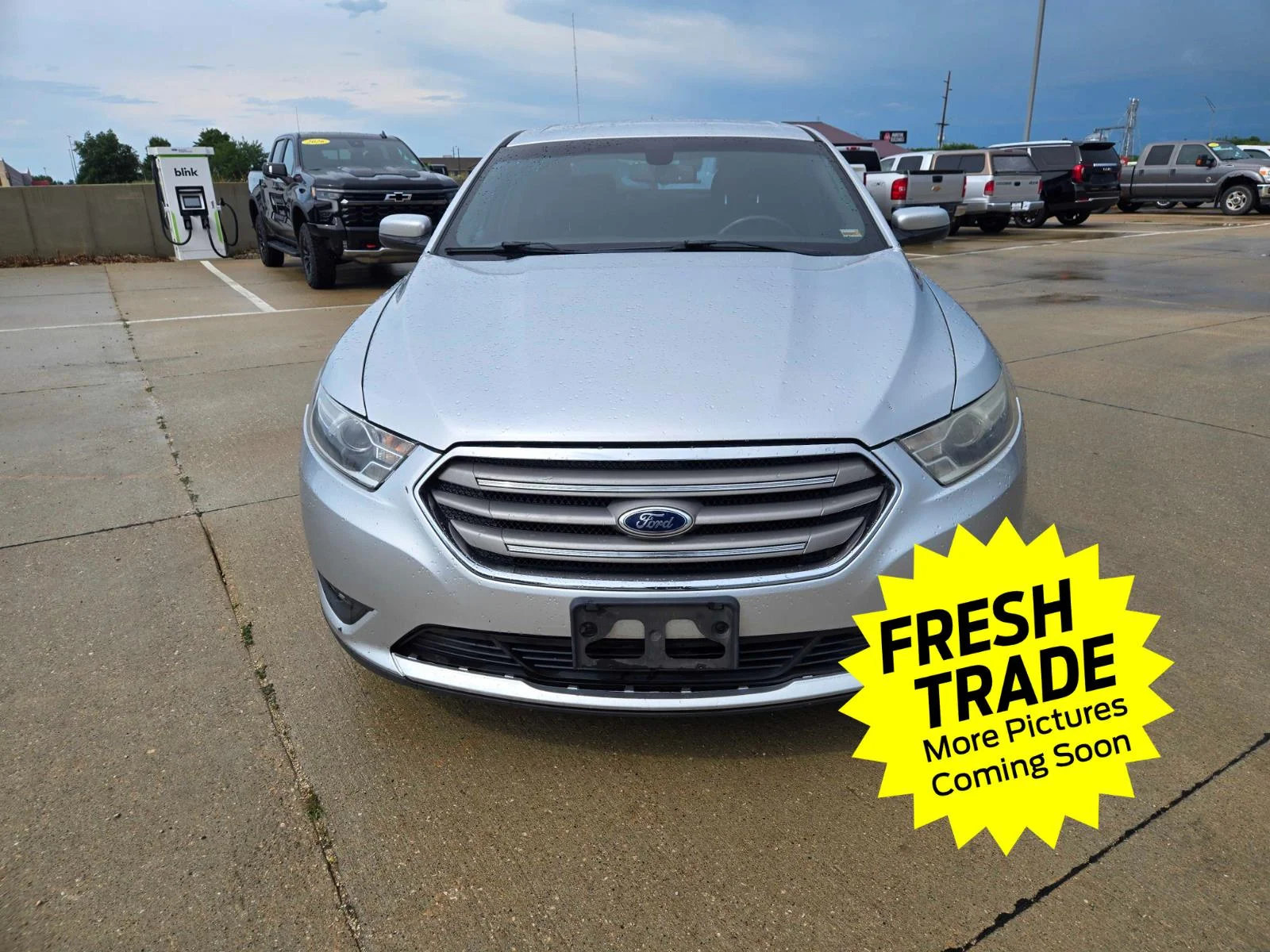 Used 2013 Ford Taurus SEL with VIN 1FAHP2E82DG233728 for sale in Charles City, IA