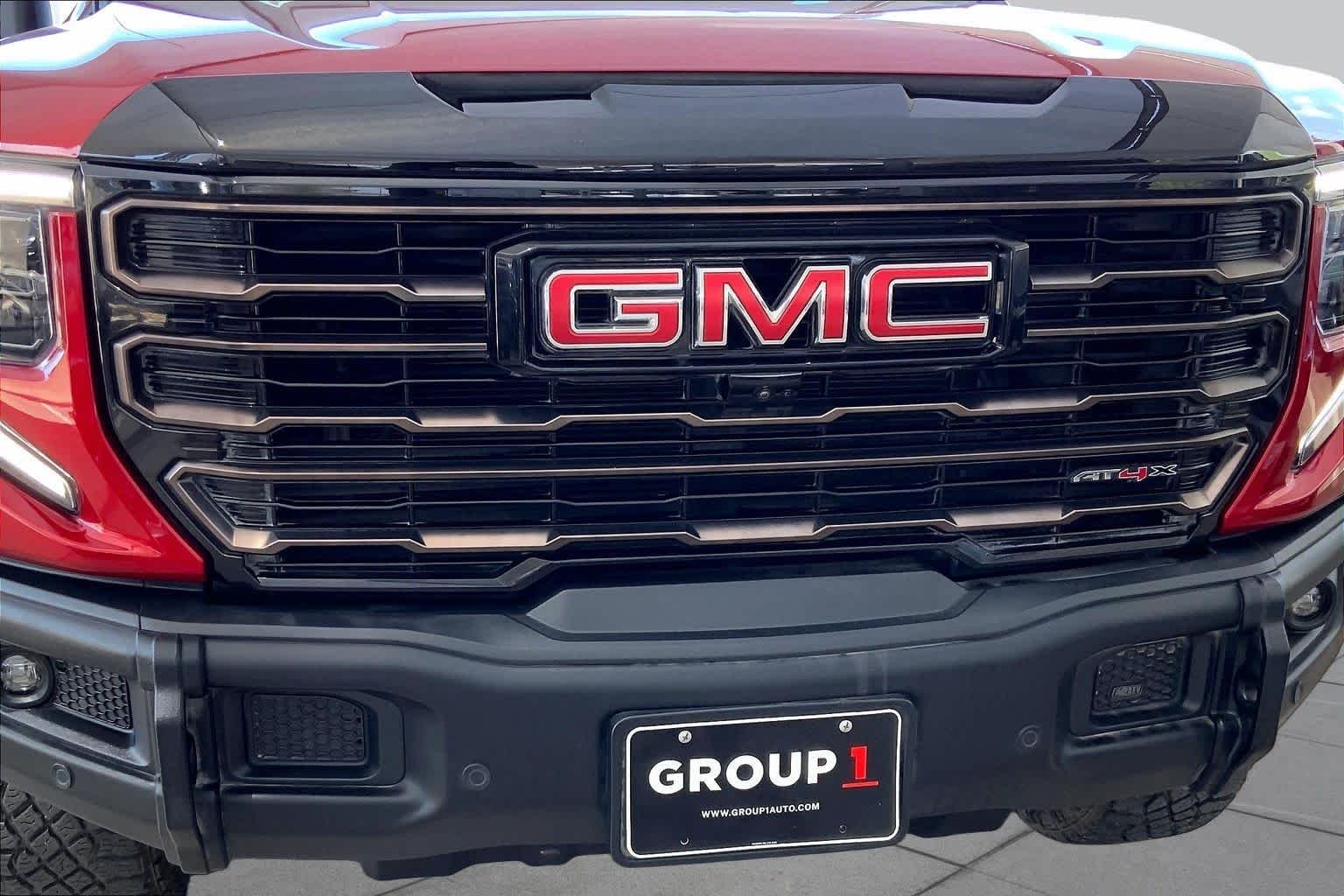 Used 2024 Volcanic Red Tintcoat GMC AT4X image 30