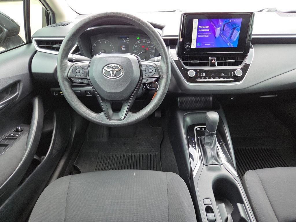 Used 2023 Midnight Black Metallic Toyota Hybrid LE image 25