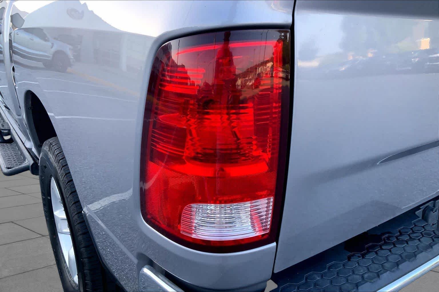 Used 2021 Billet Silver Metallic Clearcoat Ram SLT image 26